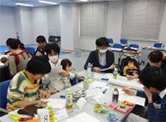 Working with spouses in a seminar to support employees returning after childcare leave