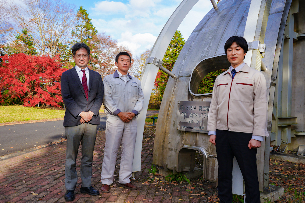 Mr.Hanada, Shibama and Sagawa standing in front of JT-60SA’s monument 