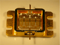 Photograph of packaged device with four chips