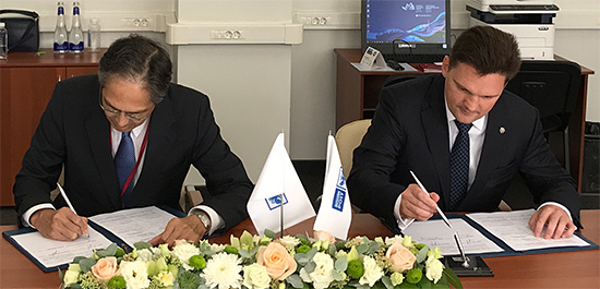 Russian Post Podguzov CEO signed with Takatsuji Director Image1