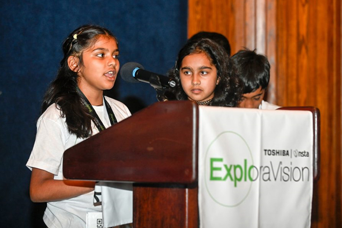 Winners presenting their projects to members of both houses of the U.S. Congress