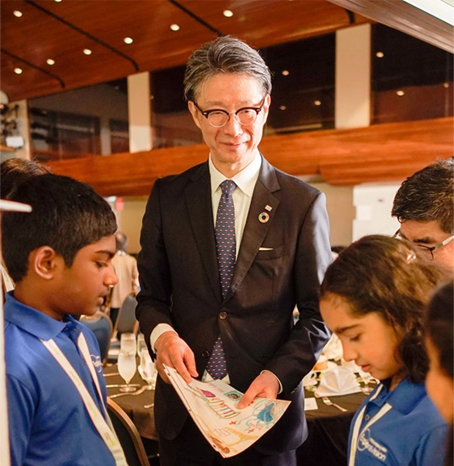 Winning team members showcasing the team’s idea