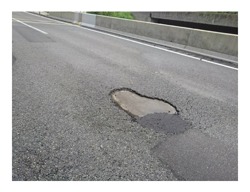 Figure 1: A pothole on an expressway